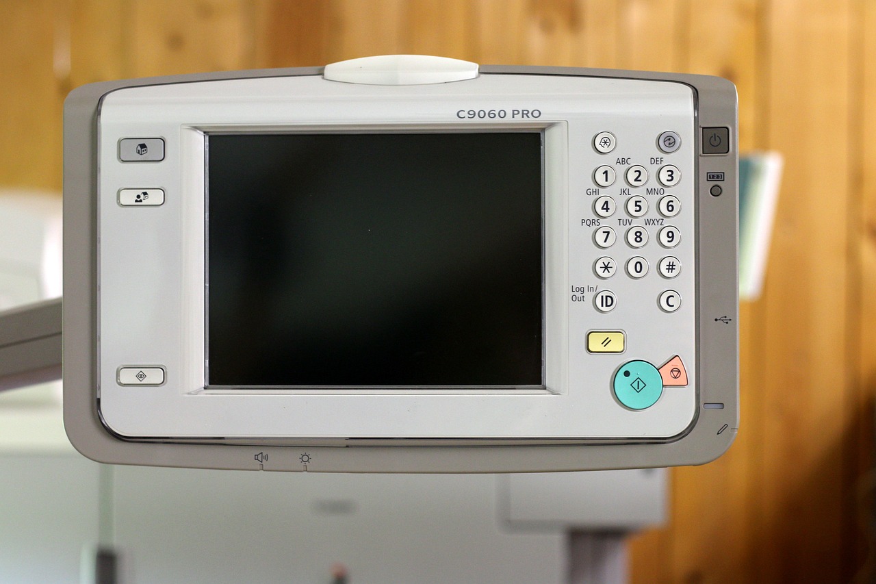 a digital printer screen with buttons