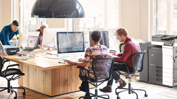 People working in a bright office